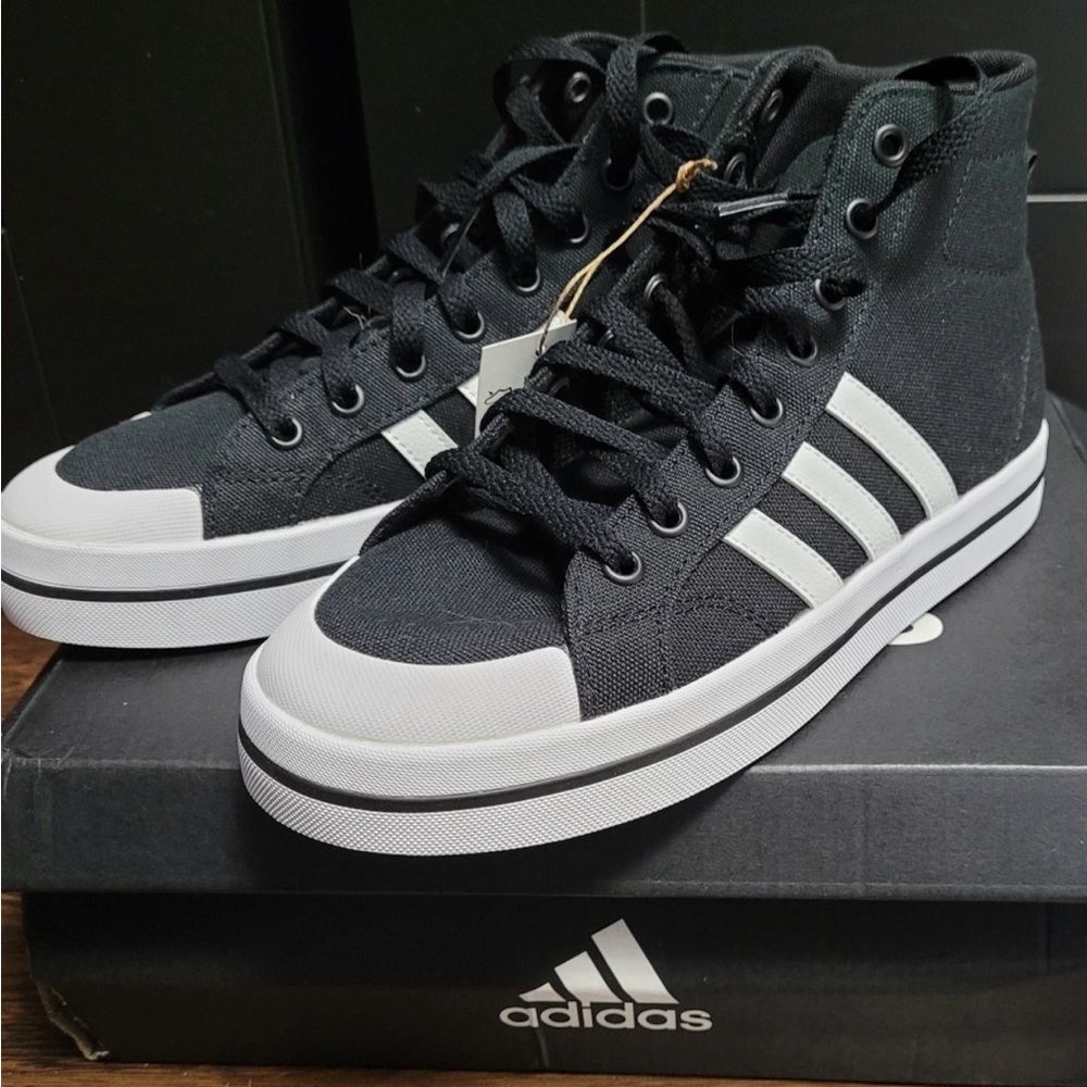 BRAND NEW Adidas Bravada Mid-high top, black & white athletic shoes.